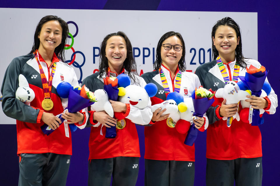 Singapore's gold-winning women's 4x200m freestyle team at the SEA Games: (from left) Quah Ting Wen, Quah Jing Wen, Gan Chin Hwee, Christy Chue. (PHOTO: SNOC/Andy Chua)