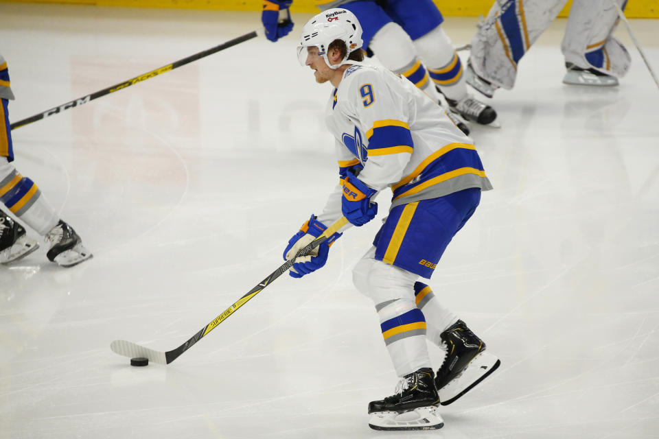 Buffalo Sabres forward Jack Eichel (9) skates during warm ups prior to the first period of an NHL hockey game against the New Jersey Devils, Thursday, Feb. 25, 2021, in Buffalo, N.Y. (AP Photo/Jeffrey T. Barnes)