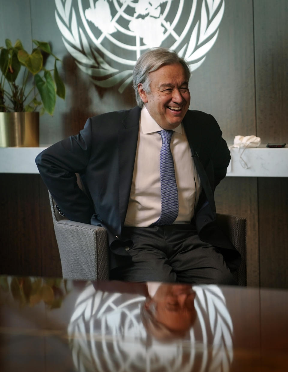 United Nations Secretary-General António Guterres prepares for an interview, Wednesday Oct. 21, 2020, at U.N. headquarters. (AP Photo/Bebeto Matthews)