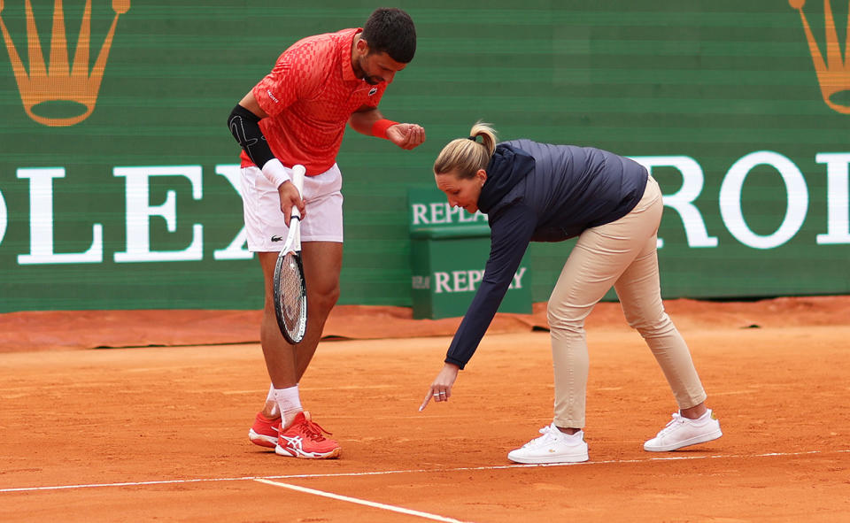 Novak Djokovic, pictured here arguing with chair umpire Aurelie Tourte.