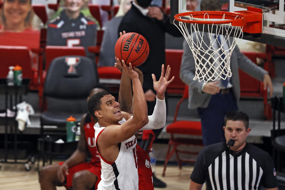 Texas Tech's Kevin McCullar (15) shoots during the first half of the team's NCAA college basketball game against Incarnate Word, Tuesday, Dec. 29, 2020, in Lubbock, Texas. (AP Photo/Brad Tollefson)