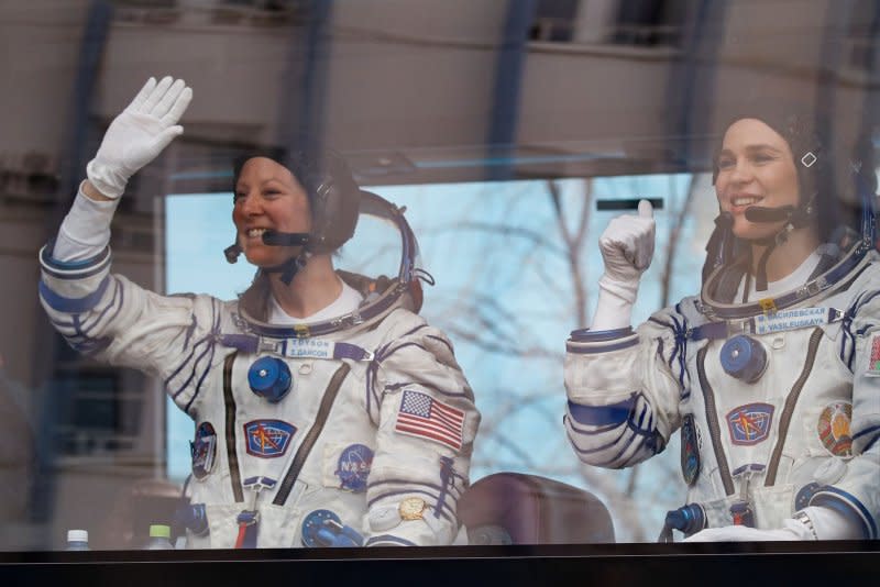 NASA astronaut Tracy Dyson (L) and Belarus spaceflight participant Marina Vasilevskaya check their spacesuits before their launch to the International Space Station on March 23. Pool Photo by Pavel Mikheyev/EPA-EFE