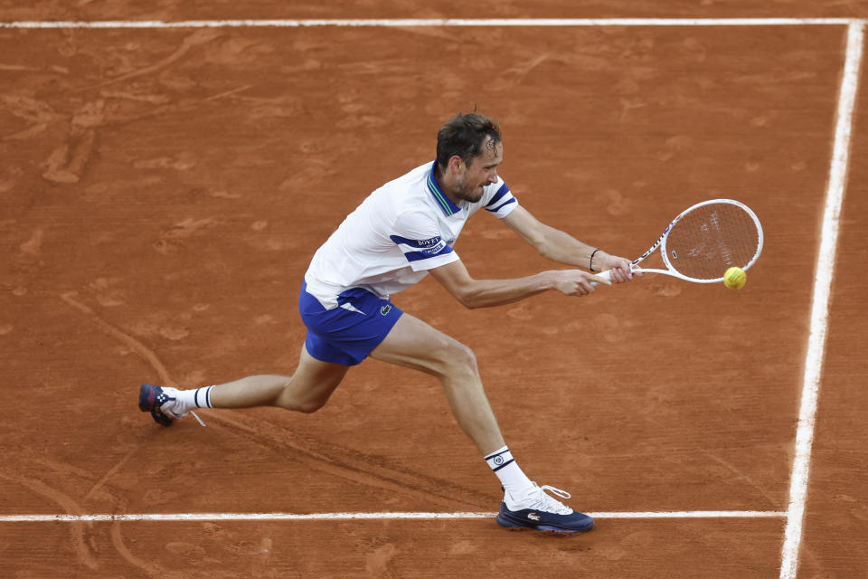 Russia's Daniil Medvedev plays a shot against Tomas Machac of the Czech Republic during their third round match of the French Open tennis tournament at the Roland Garros stadium in Paris, Saturday, June 1, 2024. (AP Photo/Jean-Francois Badias)