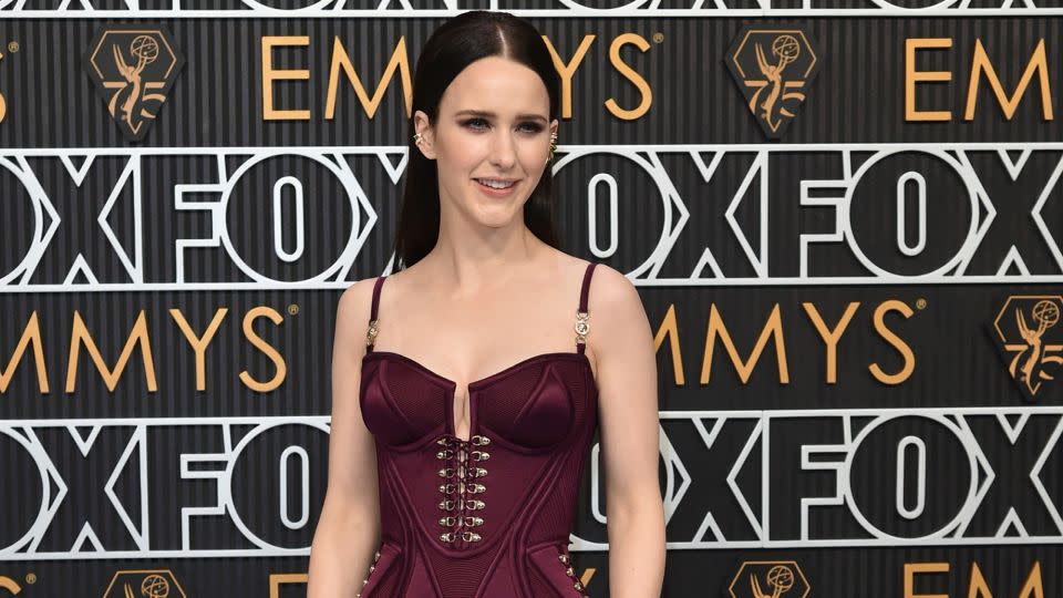 Rachel Brosnahan, nominated for “The Marvelous Mrs. Maisel,” brought a little gothic glam to the event with a beautifully structured wine-colored Versace dress with corset-style bustier. - Richard Shotwell/Invision/AP