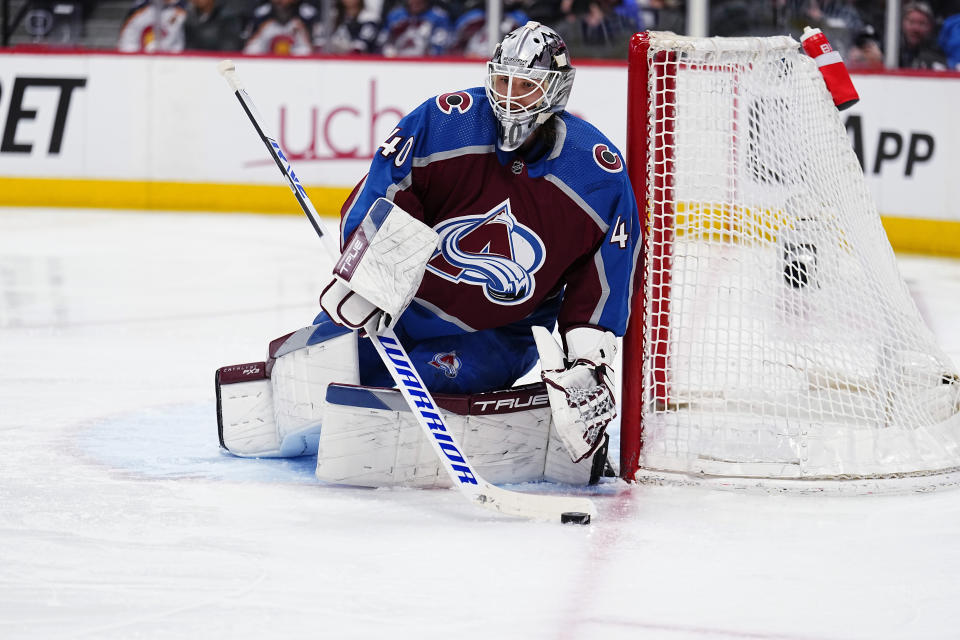 Colorado Avalanche goaltender Alexandar Georgiev blocks a Seattle Kraken shot during the second period of Game 1 of a first-round NHL hockey playoff series Tuesday, April 18, 2023, in Denver. (AP Photo/Jack Dempsey)