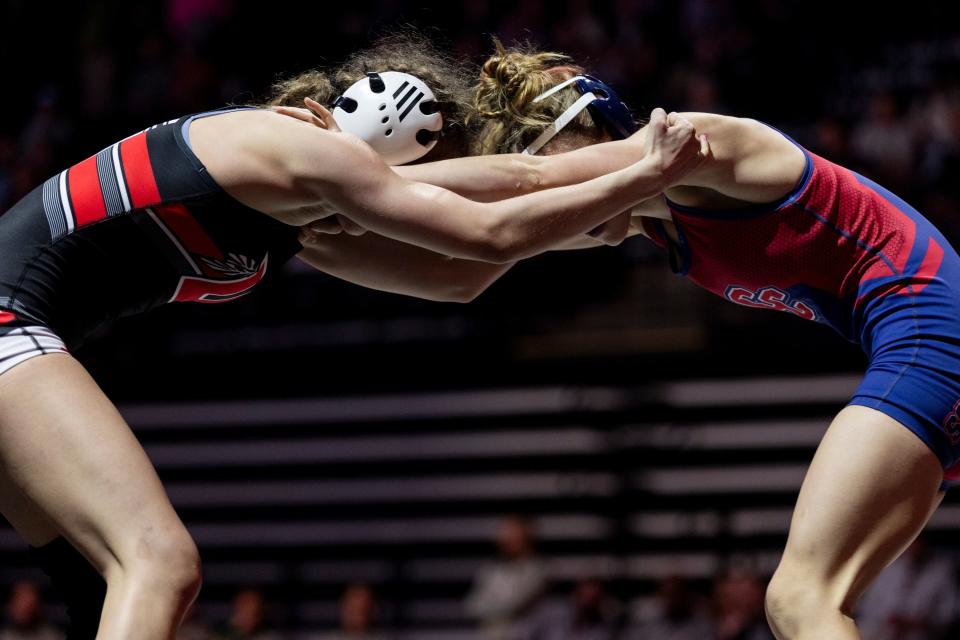Uintah’s Chanley Green and Crimson Cliffs’ Quinci Smith compete in the 4A Girls Wrestling State Championships at the UCCU Center in Orem on Thursday, Feb. 15, 2024. | Marielle Scott, Deseret News