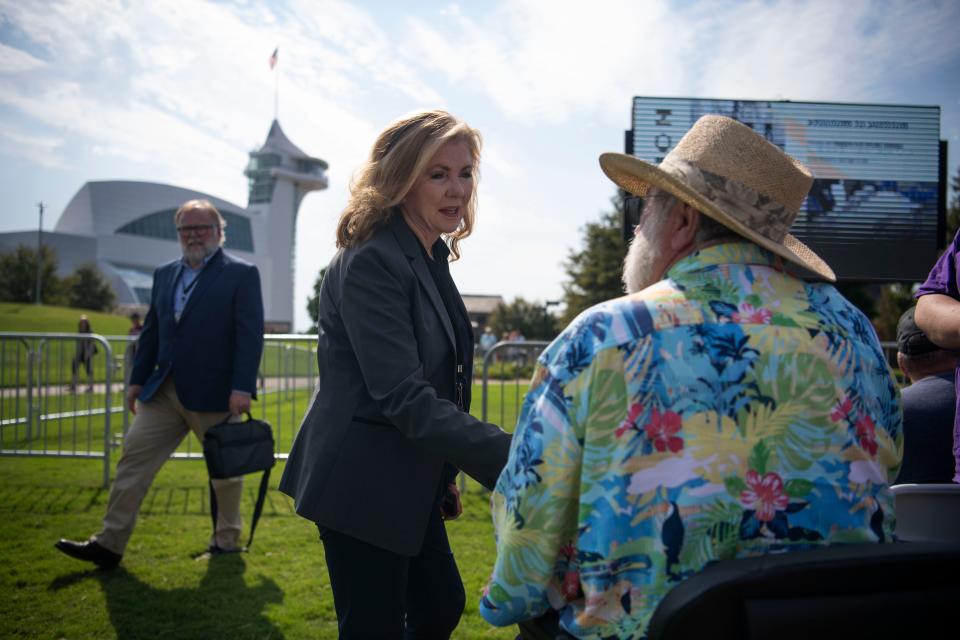 U.S. Sen. Marsha Blackburn, R-Tennessee, greets Roland Harrah, of Brownsville, while during the Freedom Forum, First Amendment Festival at Discovery Park of America in Union City, Tenn., Saturday, Sept. 24, 2022.