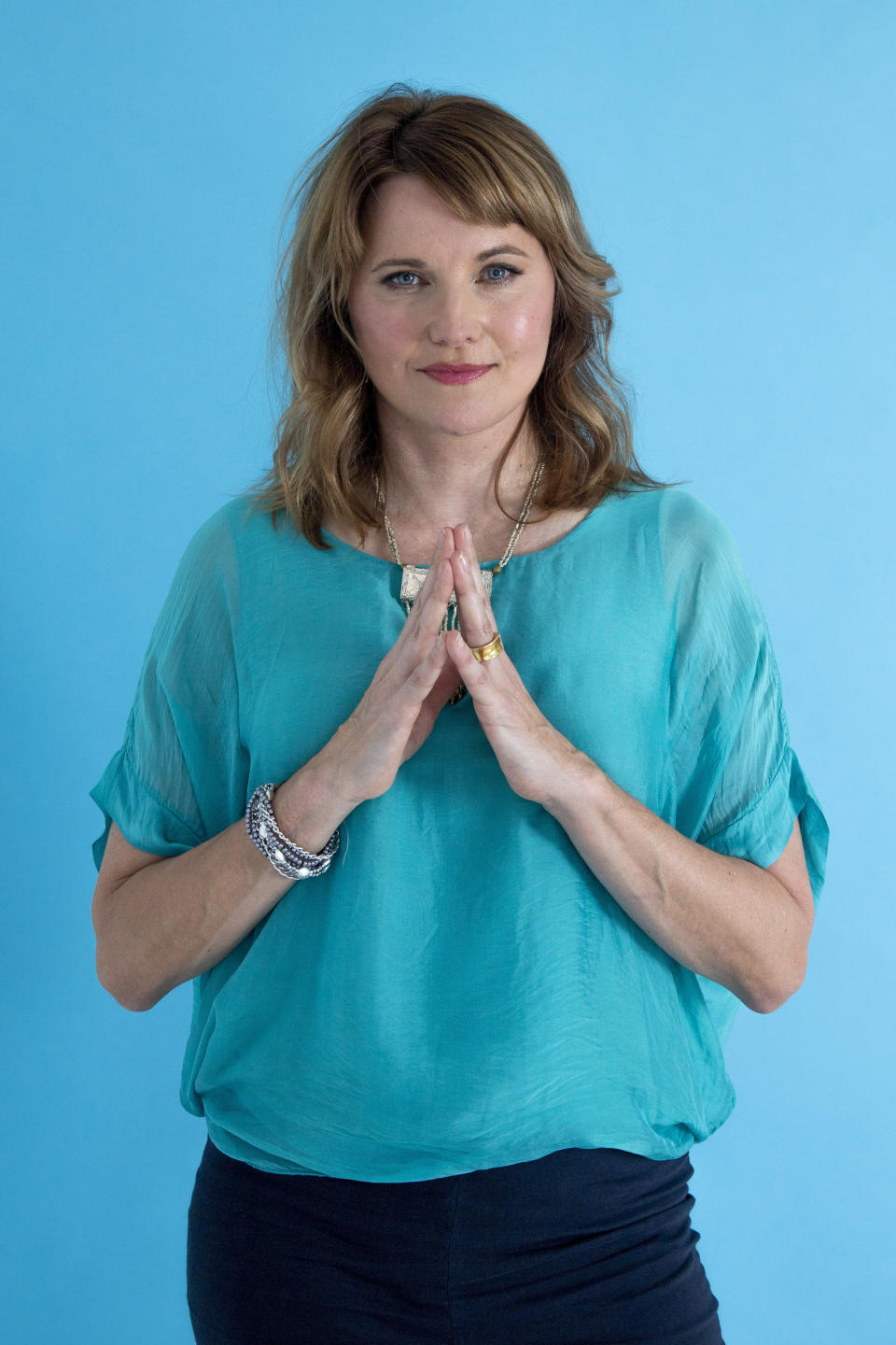 This July 22, 2019 photo shows actress Lucy Lawless posing for a portrait in New York to promote her new crime TV series “My Life Is Murder,” which premieres on Acorn TV starting Aug. 5. (Photo by Andy Kropa/Invision/AP)