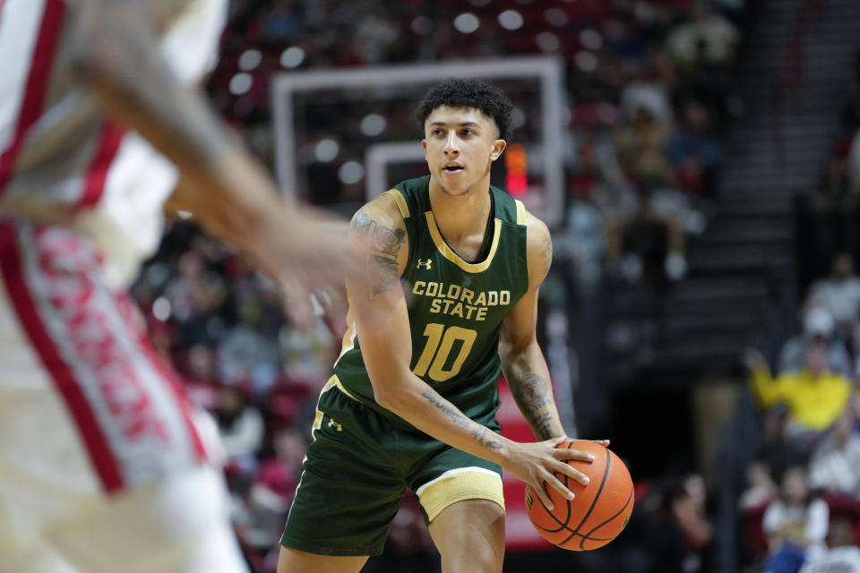 Colorado State guard Nique Clifford (10) controls the ball during the second half of an NCAA college basketball game against UNLV Saturday, Feb. 24, 2024, in Las Vegas. (AP Photo/Lucas Peltier)