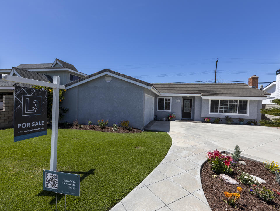 Huntington Beach, CA - April 22: A view of a home for sale at center of photo, 20821 Catamaran Ln. in Huntington Beach, listed at $1,199,000 Friday, April 22, 2022. The median home price in Orange Count has reached $1 million for the first time in history. (Allen J. Schaben / Los Angeles Times via Getty Images)