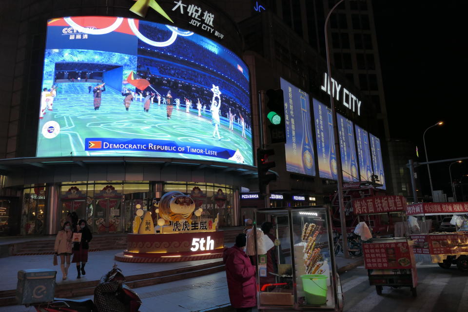 An outdoor screen shows live broadcast of the opening ceremony of the Beijing 2022 Winter Olympic Games on February 4, 2022 in Tianjin, China. (VCG/VCG via Getty Images)