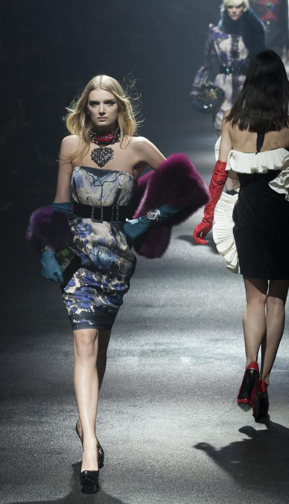 A model wears a creations by Israeli fashion designer Alber Elbaz and Dutch fashion designer Lucas Ossendrijver for the fashion house Lanvin collection for her the Fall-Winter, ready-to-wear 2013 fashion collection, during Paris Fashion week, Friday, March 2, 2012. (AP Photo/Jacques Brinon)