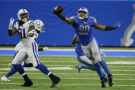 Detroit Lions defensive end Trey Flowers (90) deflects a pass intended for Indianapolis Colts tight end Mo Alie-Cox (81) during the first half of an NFL football game, Sunday, Nov. 1, 2020, in Detroit. (AP Photo/Duane Burleson)