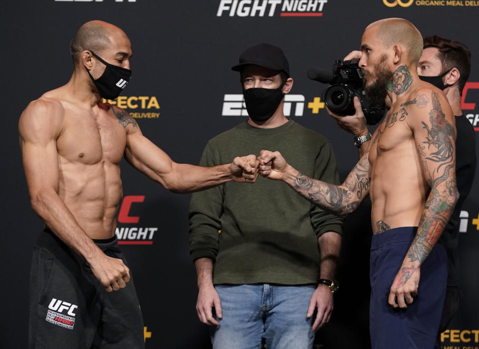 LAS VEGAS, NEVADA - DECEMBER 18: (L-R) Opponents Jose Aldo of Brazil and Marlon Vera of Ecuador face off during the UFC Fight Night weigh-in at UFC APEX on December 18, 2020 in Las Vegas, Nevada. (Photo by Cooper Neill/Zuffa LLC via Getty Images)