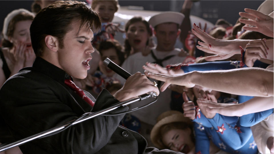 <p> During the opening split-screen montage of Elvis performing in his iconic blue jumpsuit, there's a moment when the screen is a two-panel split as the King does karate moves. One is Presley and one is Butler – the footage was taken from a costume test. </p>