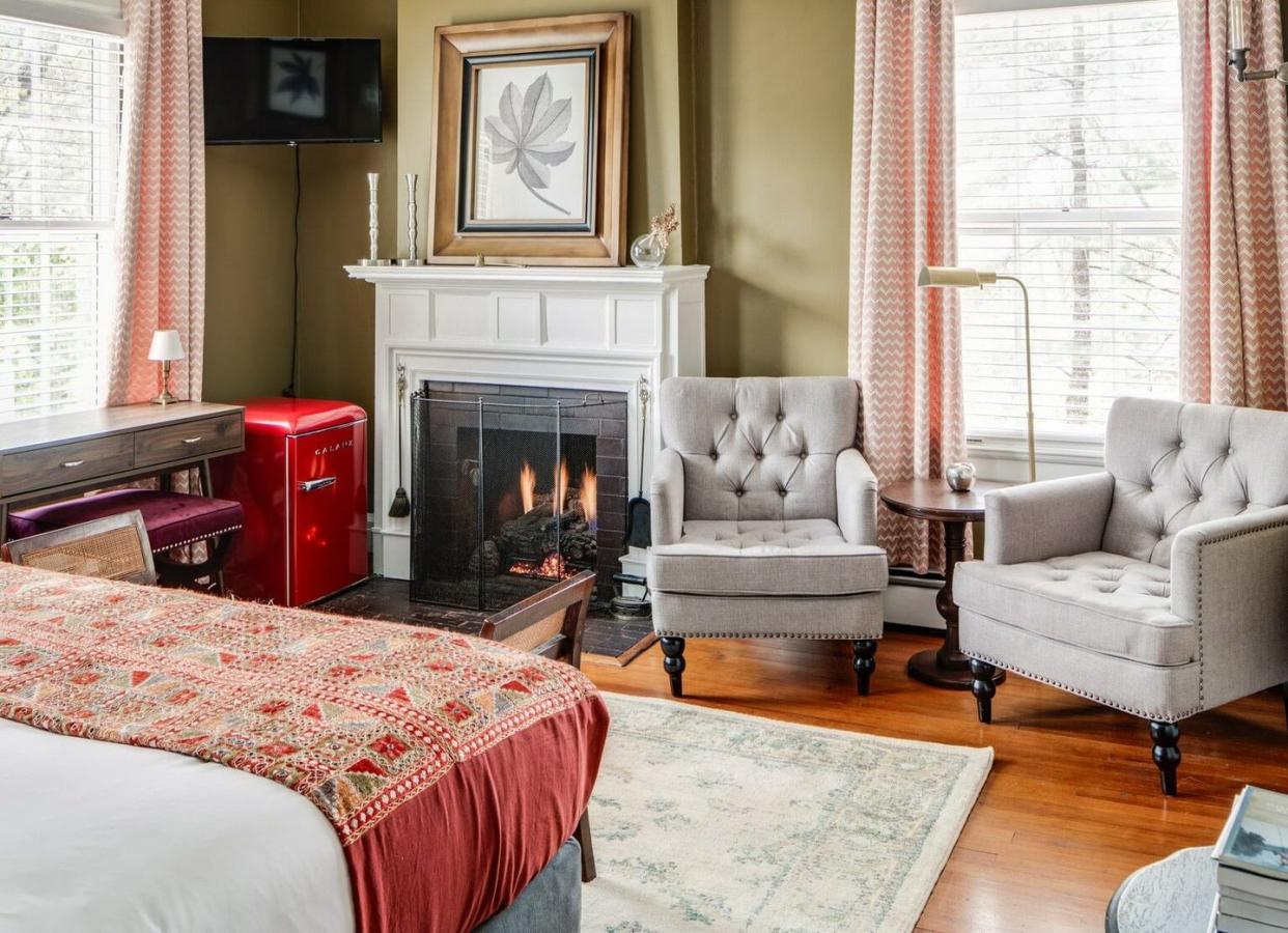 hotel room with fireplace