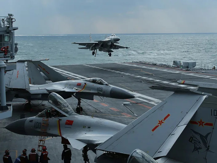 hinese J-15 fighter jets on the deck of the Liaoning aircraft carrier during military drills in the Yellow Sea, off China's east coast.
