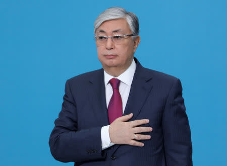 Kazakhstan's President Kassym-Jomart Tokayev listens the national anthem during a congress of the Nur Otan ruling party in Nur-Sultan, Kazakhstan, April 23, 2019. REUTERS/Mukhtar Kholdorbekov