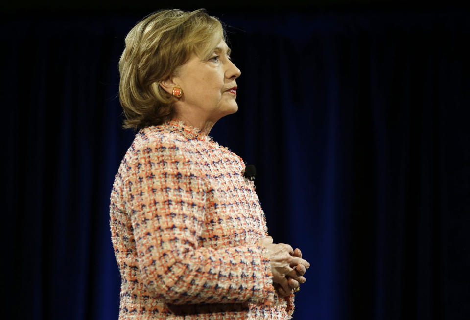 Former Secretary of State Hillary Rodham Clinton delivers her Simmons College Leadership Conference keynote address at the Seaport World Trade Center Wednesday, April 23, 2014, in Boston. (AP Photo/Stephan Savoia)