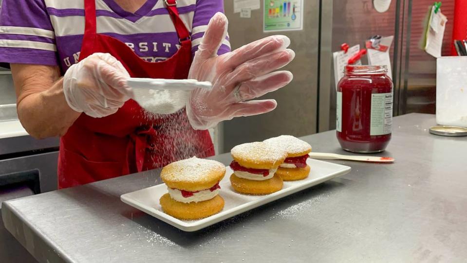 Raspberry mini vickis are sponge cake sandwiches filled with vanilla buttercream and raspberry jam.