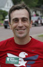 In this June 10, 2018 photo, Minnesota 1st District congressional candidate Dan Feehan poses before a parade in Waterville, Minn. Waterville's 54th annual Bullhead Days parade included Democrat Feehan and Republican Jim Hagedorn, candidates who came to shake as many hands as they could in the open seat race which promises to be one of the most closely watched races in the country. (AP Photo/Jim Mone)