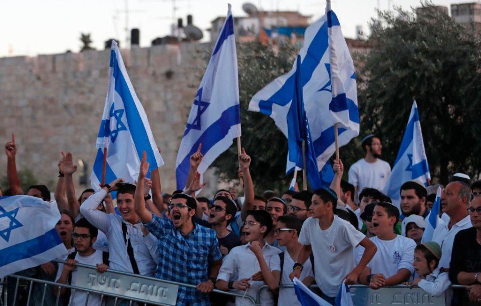 Far-right Israeli nationalists fly the Israeli flag in Jerusalem’s Old City on Jerusalem Day last month (AFP/Getty)