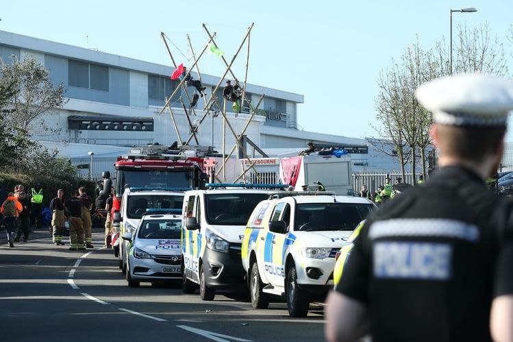 Police and fire services outside the Newsprinters printing works at Broxbourne, Hertfordshire, as protesters use bamboo lock-ons continue to block the road: PA Wire/PA Images