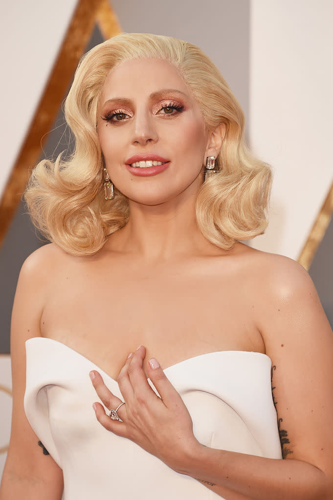 <p>After releasing critically-acclaimed album <em>Artpop</em>, Lady Gaga decided to take a break from her career in order to focus her energy on her mental health. In an interview with <em>The Mirror,</em> she described her rise to fame as ‘traumatic’ and encouraged others to ”fess up to’ our mental health battles. <em>[Photo: PA]</em> </p>