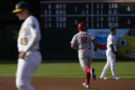 Philadelphia Phillies' Kyle Schwarber (12) runs the bases after hitting a solo home run against the Oakland Athletics during the first inning of a baseball game in Oakland, Calif., Friday, June 16, 2023. (AP Photo/Godofredo A. Vásquez)