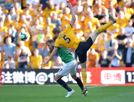 Soccer Football - Premier League - Wolverhampton Wanderers v Brighton & Hove Albion - Molineux Stadium, Wolverhampton, Britain - April 20, 2019 Wolverhampton Wanderers' Ryan Bennett in action with Brighton's Glenn Murray REUTERS/Peter Powell