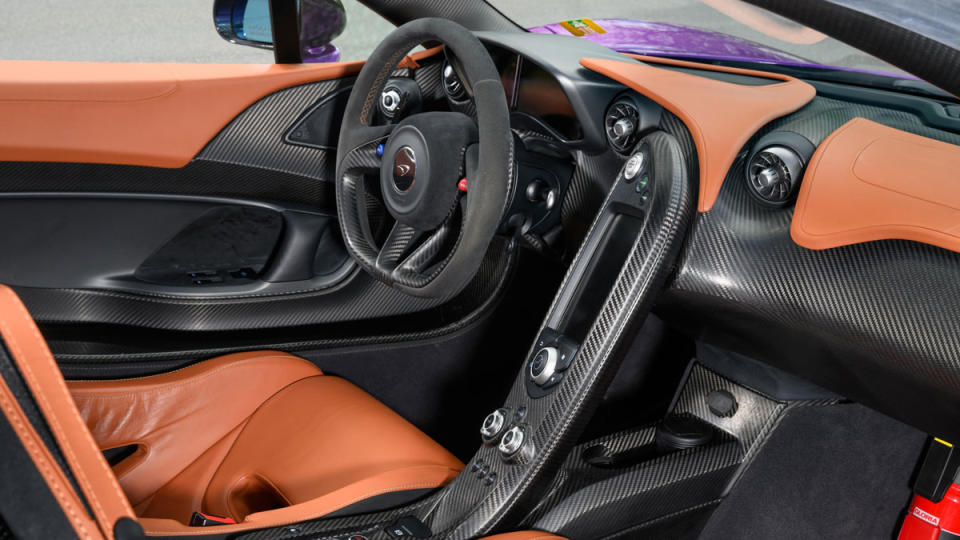 The interior of a 2015 McLaren P1 hybrid supercar.