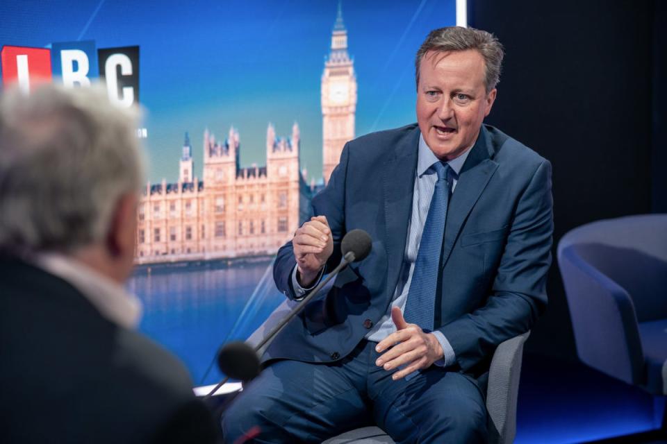 David Cameron being interviewed by LBC in May (PA)