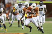 Johnathan Gray #32 of the Texas Longhorns runs the ball against the West Virginia Mountaineers at Darrell K Royal-Texas Memorial Stadium on October 6, 2012 in Austin, Texas. (Photo by Ronald Martinez/Getty Images)