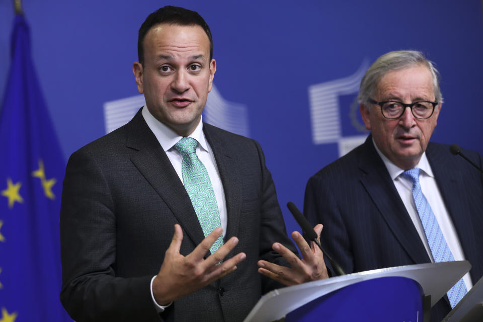 Irish Prime Minister Leo Varadkar, left, answers a question during a joint news conference with European Commission President Jean-Claude Juncker following their meeting at the European Commission headquarters in Brussels, Wednesday, Feb. 6, 2019. (AP Photo/Francisco Seco)