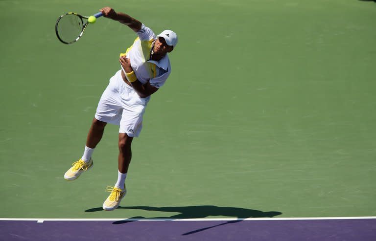 Jo-Wilfried Tsonga of France serves against ViktorTroicki of Serbia during their second round match at the Sony Open at Crandon Park Tennis Center on March 23, 2013 in Key Biscayne, Florida. Tsonga won 7-6 (8/6), 6-3