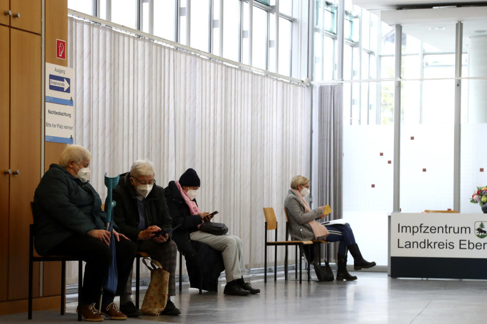 People wait after their vaccinations at a local vaccination centre as the spread of the coronavirus disease (COVID-19) continues in Ebersberg near Munich, Germany, Monday, March 22, 2021. (AP Photo/Matthias Schrader)