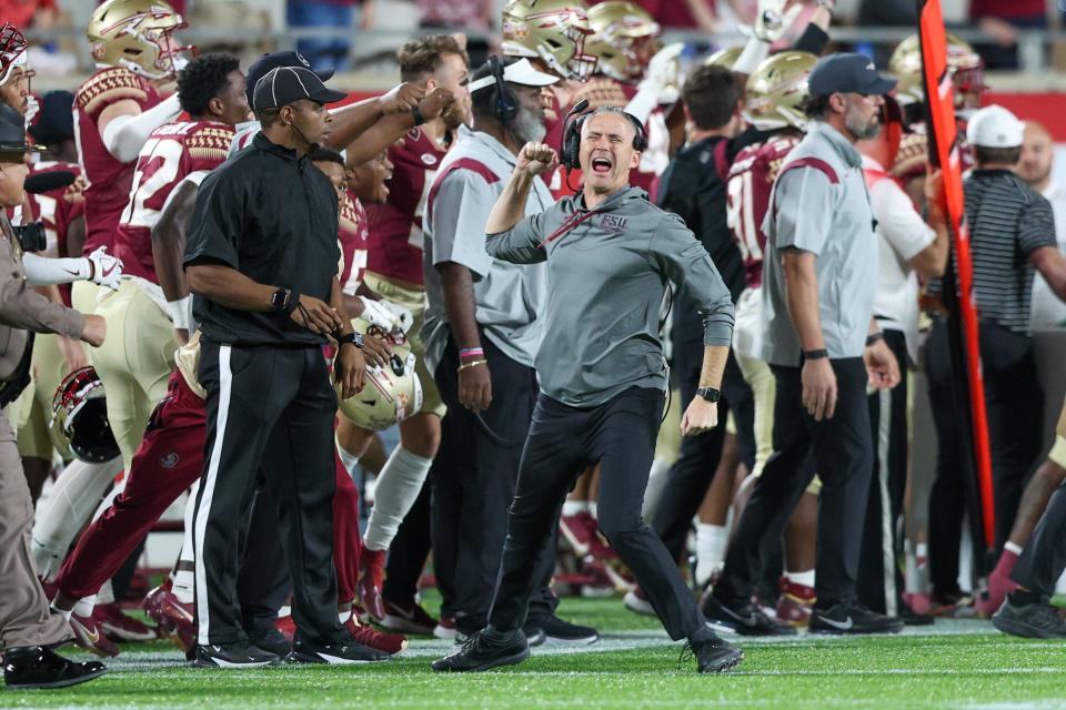 Dec 29, 2022; Orlando, Florida, USA; Florida State Seminoles head coach Mike Norvell reacts after beating the Oklahoma Sooners in the 2022 Cheez-It Bowl at Camping World Stadium. Mandatory Credit: Nathan Ray Seebeck-USA TODAY Sports