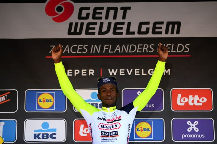 WEVELGEM, BELGIUM - MARCH 27: Biniam Hailu Girmay of Eritrea and Team Intermarche - Wanty - Gobert Materiaux celebrates winning the race on the podium ceremony after the 84th Gent-Wevelgem in Flanders Fields 2022 - Men's Elite a 248,8km one day race from Ypres to Wevelgem / #GWE22 / #WorldTour / on March 27, 2022 in Wevelgem, Belgium. (Photo by Tim de Waele/Getty Images)