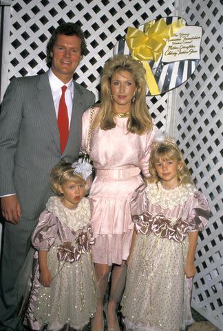 <p>Jim Smeal/Ron Galella Collection via Getty</p> The Hilton family in a throwback photo