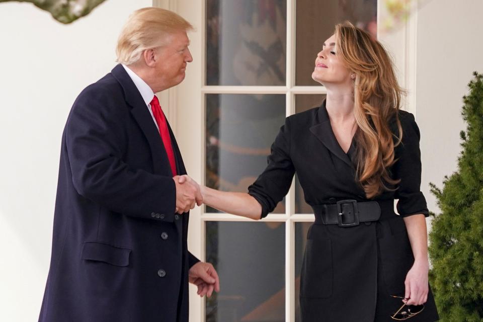 President Trump shakes hands with outgoing White House