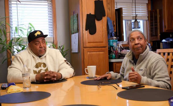 PHOTO: Damone Mapps and his mother, Barbara Mapps Massey, sit around their kitchen table discussing their loved one, Katherine Massey, who was killed in the May 14, 2022, mass shooting at a Tops store on Buffalo's east side. (Alysha Webb/ABC News)