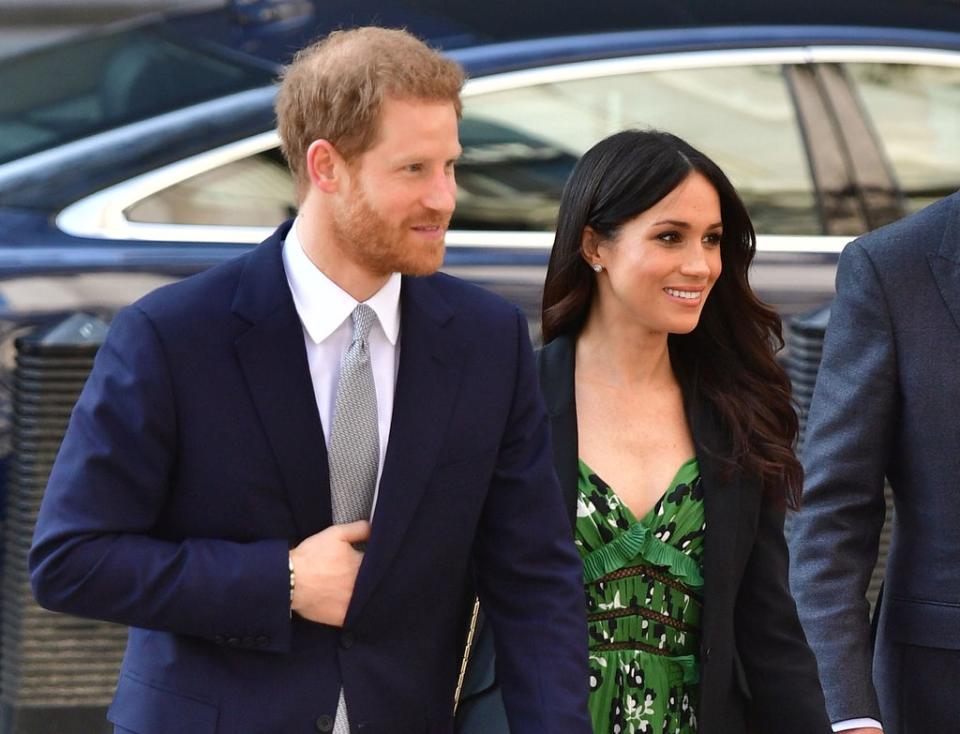 Meghan and Harry in 2018 before they stood down as senior members of the royal family (PA)
