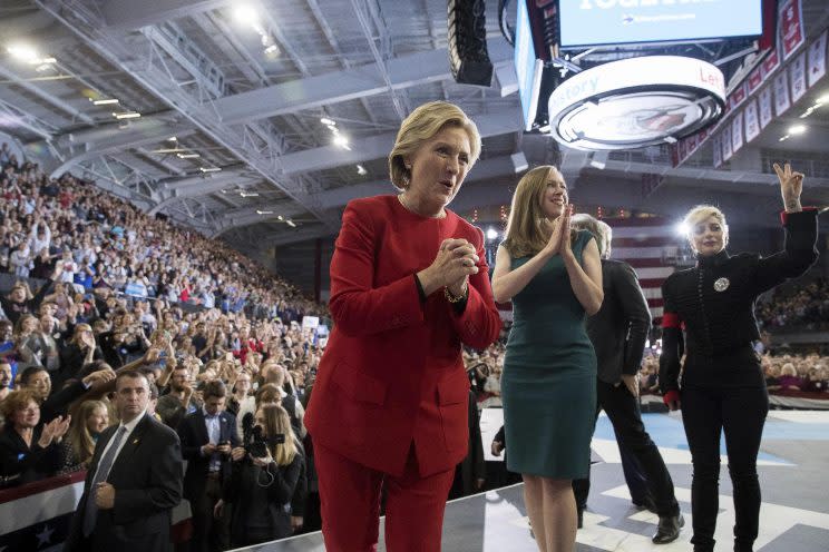 Hillary Clinton, Chelsea Clinton and musician Lady Gaga greet members of the audience after speaking at a midnight rally in Raleigh, N.C. (Photo: Andrew Harnik/AP)