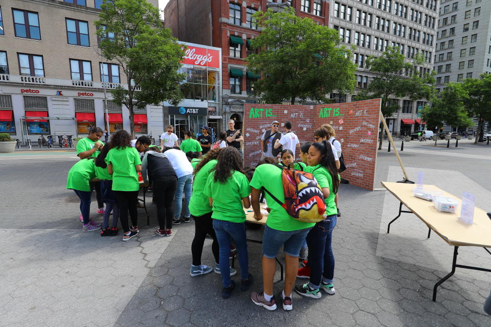 <p>Students create art for the LEAP Public Art Program’s citywide exhibition in Union Square Park in New York City on June 5, 2018. (Photo: Gordon Donovan/Yahoo News) </p>