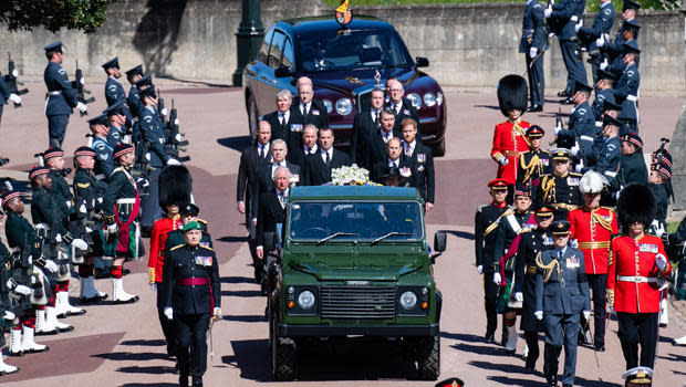 Prince Charles, Prince of Wales;  Prince Andrew, Duke of York; Prince Edward, Earl of Wessex; Prince William, Duke of Cambridge; Peter Phillips; Prince Harry, Duke of Sussex; Earl of Snowdon David Armstrong-Jones; and Vice-Admiral Sir Timothy Laurence follow Prince Philip, Duke of Edinburgh's coffin during the Ceremonial Procession on April 17, 2021 in Windsor, England. / Credit: Pool/Samir Hussein, Wireimage via Getty Images