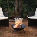 <p> Simple and modern, sure it&apos;s one of the most classic fire pit ideas going but sometimes basic works, right? The slimline tripod legs and open round top give this cast iron fire pit full marks for elegance &#x2013; plus it&apos;s portable and small &#x2013; so it makes a great addition to small backyard areas too. </p>