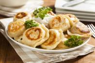 <p>Polish immigrants brought pierogies to the Midwest, which are so beloved in some cities, you can have pierogies as a side instead of fries at restaurants! Recreate that wonder at home with this easy take on pierogies, which <a href="https://www.thedailymeal.com/cook/10-things-you-didn-t-know-you-could-make-bisquick-slideshow?referrer=yahoo&category=beauty_food&include_utm=1&utm_medium=referral&utm_source=yahoo&utm_campaign=feed" rel="nofollow noopener" target="_blank" data-ylk="slk:uses biscuit mix;elm:context_link;itc:0;sec:content-canvas" class="link ">uses biscuit mix</a> in the dough.</p> <p><a href="https://www.thedailymeal.com/potato-cheese-pierogi-recipe?referrer=yahoo&category=beauty_food&include_utm=1&utm_medium=referral&utm_source=yahoo&utm_campaign=feed" rel="nofollow noopener" target="_blank" data-ylk="slk:For the Potato Cheese Pierogi recipe, click here.;elm:context_link;itc:0;sec:content-canvas" class="link ">For the Potato Cheese Pierogi recipe, click here.</a></p>