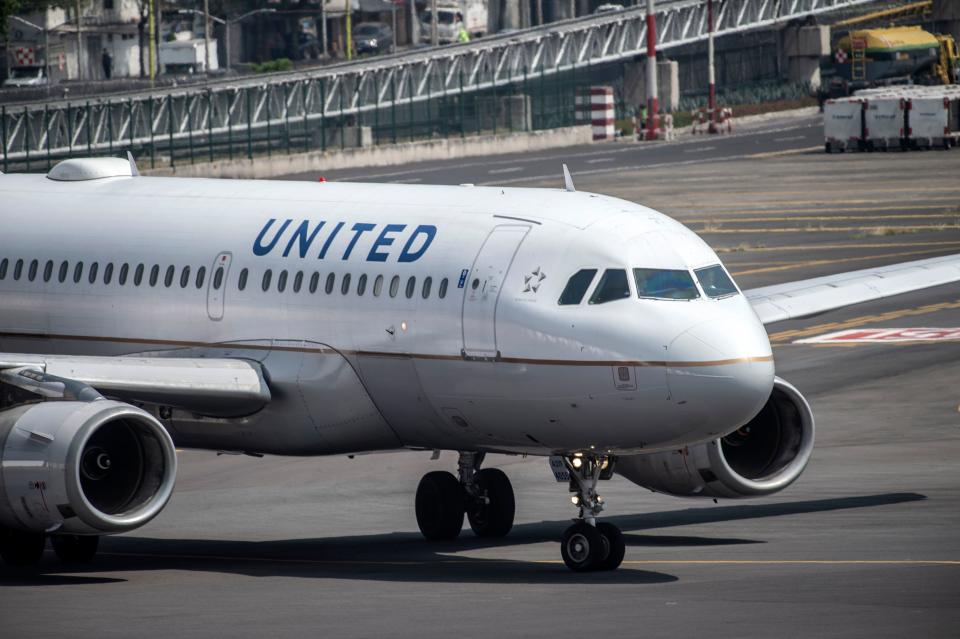 A United Airlines plane prepares to take off at the Benito Juarez International airport in Mexico City