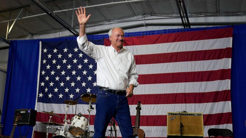 PHOTO: Republican presidential candidate former Arkansas Gov. Asa Hutchinson waves to the audience during an event on Aug. 6, 2023, in Cedar Rapids, Iowa. (Charlie Neibergall/AP)