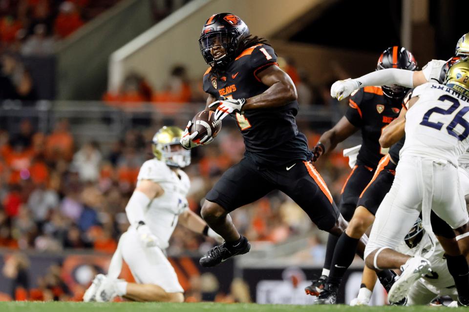 Oregon State Beavers running back Deshaun Fenwick (1) runs the ball during the second half against the UC Davis Aggies at Reser Stadium Sept. 9 in Corvallis.